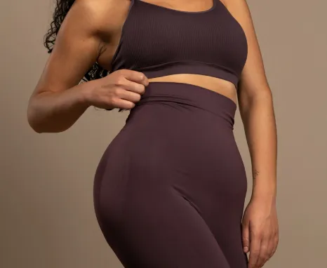 Model displaying typical results of Brazilian Butt Lift surgery in Sarasota