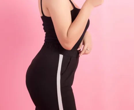 Model displaying typical results of Brazilian Butt Lift surgery in Sarasota